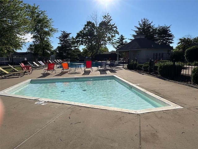 717 Sugar Glen Dr Unit 1, Saint Peters, MO 63376 - community pool featuring a patio