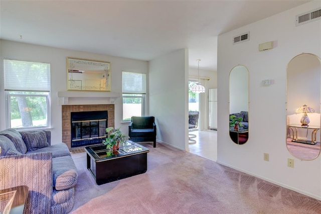 717 Sugar Glen Dr Unit 1, Saint Peters, MO 63376 - carpeted living room with a brick fireplace, baseboards, and arched walkways