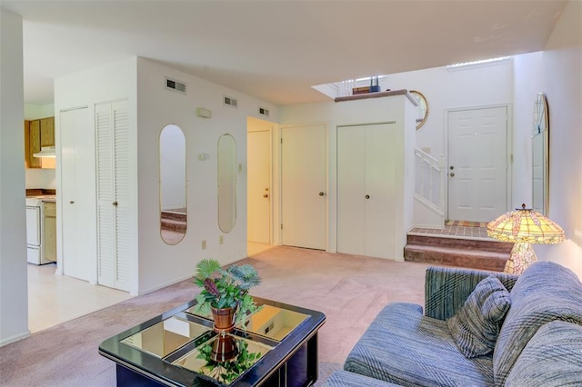 717 Sugar Glen Dr Unit 1, Saint Peters, MO 63376 - living room with light colored carpet and stairs