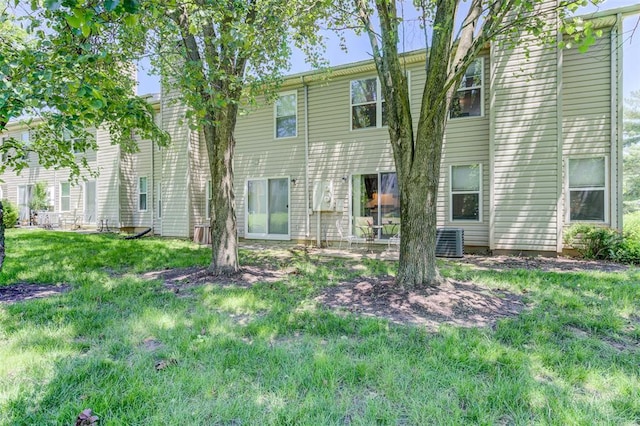 717 Sugar Glen Dr Unit 1, Saint Peters, MO 63376 - back of house with cooling unit and a yard