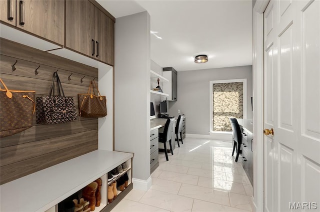 50 Lake Forest Dr, Richmond Heights, MO 63117 - mudroom featuring light marble finish flooring and baseboards