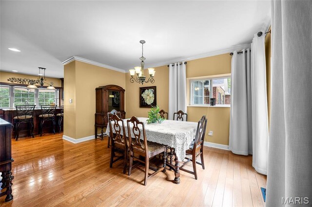 2785 Marble Springs Rd, Barnhart, MO 63012 - dining room with a chandelier, baseboards, light wood finished floors, crown molding, and recessed lighting