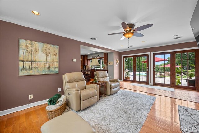 2785 Marble Springs Rd, Barnhart, MO 63012 - living room featuring ornamental molding, baseboards, a ceiling fan, wood finished floors, and recessed lighting