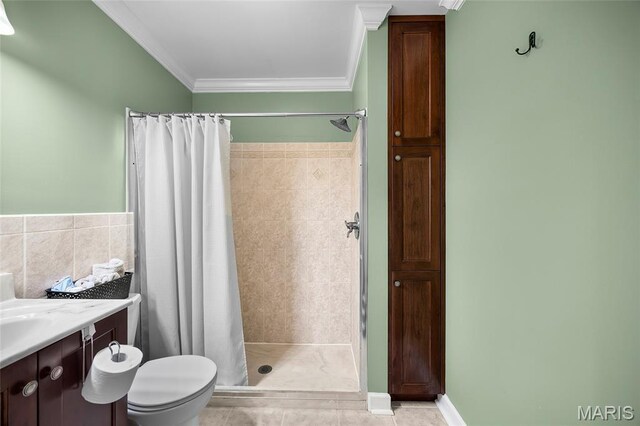 2785 Marble Springs Rd, Barnhart, MO 63012 - full bathroom featuring a stall shower, ornamental molding, toilet, vanity, and tile patterned flooring