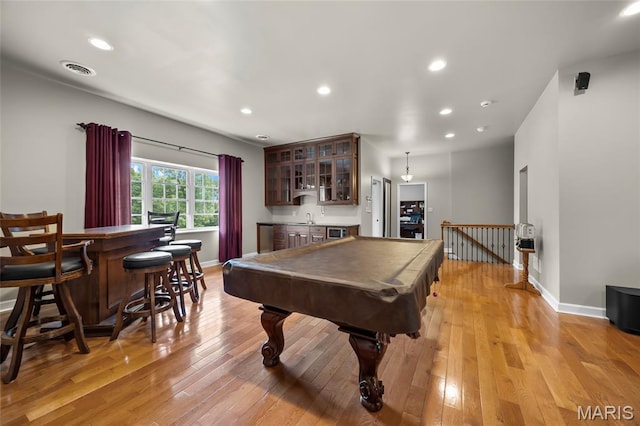 2785 Marble Springs Rd, Barnhart, MO 63012 - playroom with bar with sink, light wood-type flooring, recessed lighting, billiards, and baseboards