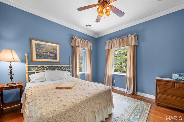 2785 Marble Springs Rd, Barnhart, MO 63012 - bedroom with baseboards, wood finished floors, ornamental molding, and ceiling fan