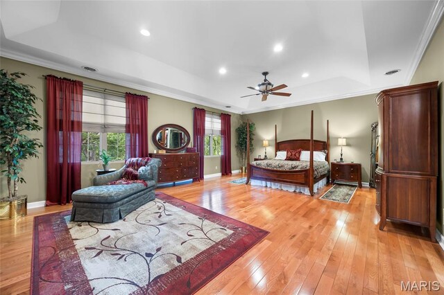 2785 Marble Springs Rd, Barnhart, MO 63012 - bedroom featuring a tray ceiling, crown molding, light wood-style flooring, baseboards, and recessed lighting