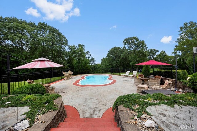 2785 Marble Springs Rd, Barnhart, MO 63012 - view of swimming pool with a patio area, a fenced backyard, and view of wooded area