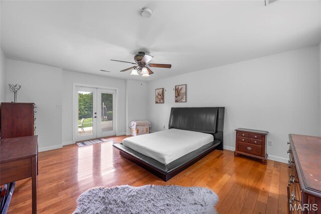 2785 Marble Springs Rd, Barnhart, MO 63012 - bedroom featuring access to exterior, light wood-style flooring, french doors, and baseboards
