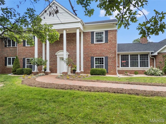2785 Marble Springs Rd, Barnhart, MO 63012 - neoclassical / greek revival house with brick siding and a front yard