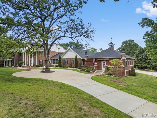 2785 Marble Springs Rd, Barnhart, MO 63012 - view of front of property with brick siding and a front yard