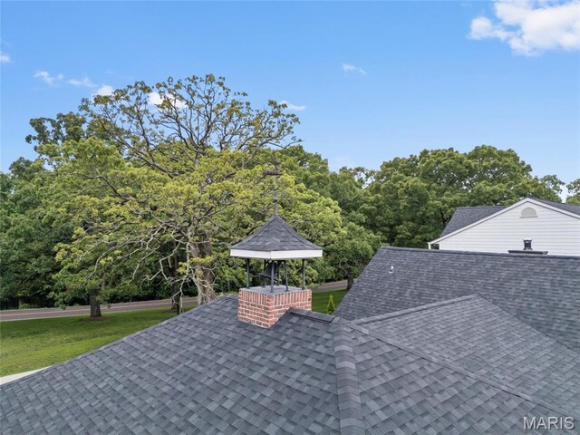 2785 Marble Springs Rd, Barnhart, MO 63012 - exterior view of a shingled roof and a chimney