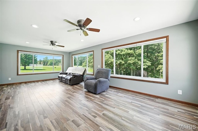 20731 Columbine Dr, Warrenton, MO 63383 - sitting room featuring wood finished floors, ceiling fan, and recessed lighting