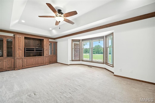 20731 Columbine Dr, Warrenton, MO 63383 - unfurnished living room with a raised ceiling, recessed lighting, a ceiling fan, and light colored carpet