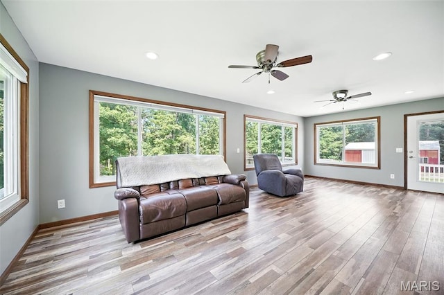 20731 Columbine Dr, Warrenton, MO 63383 - living area featuring light wood-style floors, a ceiling fan, and recessed lighting