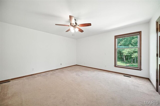 20731 Columbine Dr, Warrenton, MO 63383 - empty room featuring light carpet and ceiling fan