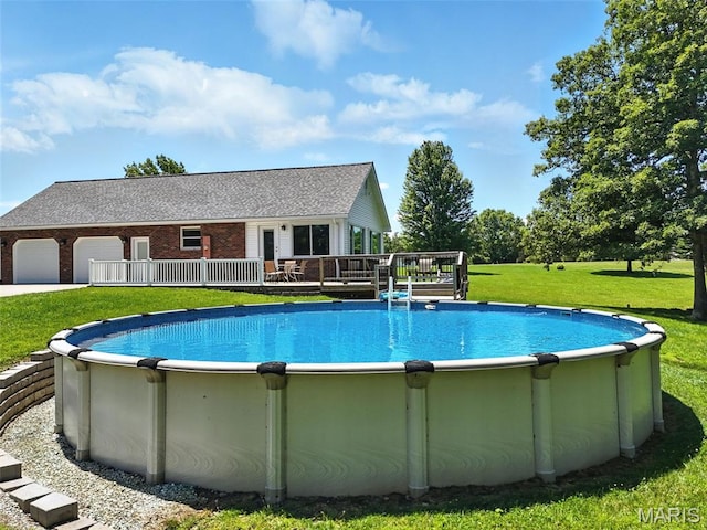20731 Columbine Dr, Warrenton, MO 63383 - swimming pool featuring a deck and a lawn