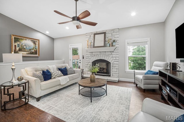1042 Windsor Crest Ct, Saint Peters, MO 63376 - living room featuring wood finished floors, a ceiling fan, recessed lighting, vaulted ceiling, and a stone fireplace