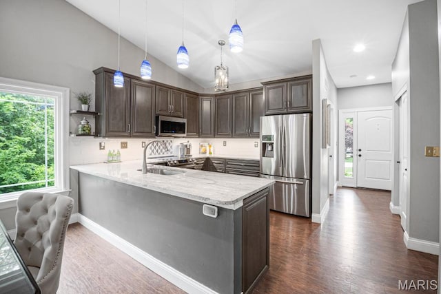 1042 Windsor Crest Ct, Saint Peters, MO 63376 - kitchen featuring stainless steel appliances, dark brown cabinets, a peninsula, dark wood-style floors, and a sink