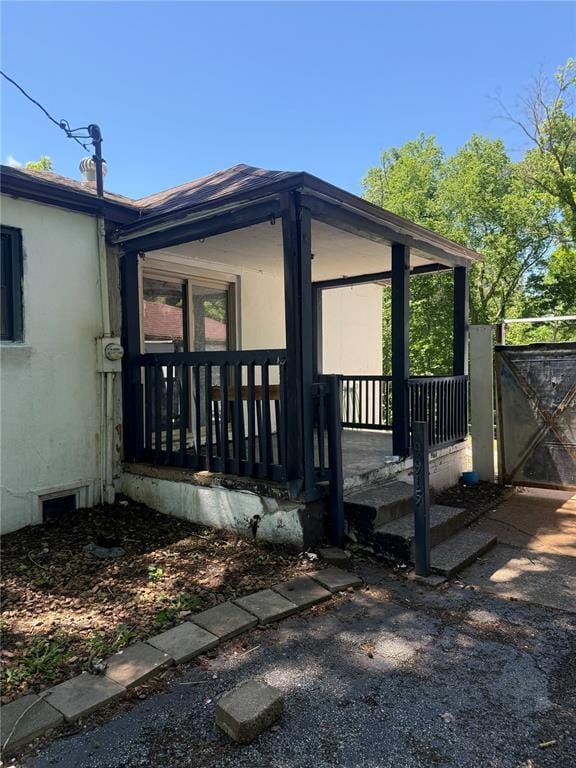 9915 N Rd, Fairview Heights, IL 62208 - view of home's exterior with a gate