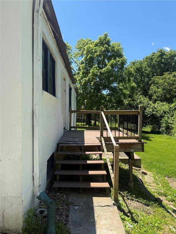 9915 N Rd, Fairview Heights, IL 62208 - deck featuring a lawn
