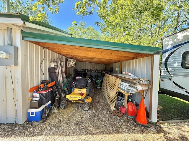 723 Ada St, Bismarck, MO 63624 - view of vehicle parking with an outbuilding and a carport