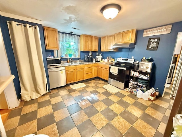 723 Ada St, Bismarck, MO 63624 - kitchen featuring stainless steel appliances, under cabinet range hood, a sink, light countertops, and light brown cabinets
