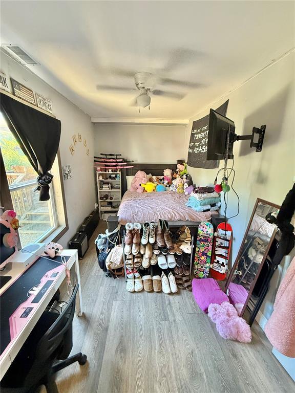 723 Ada St, Bismarck, MO 63624 - bedroom featuring wood finished floors and ceiling fan
