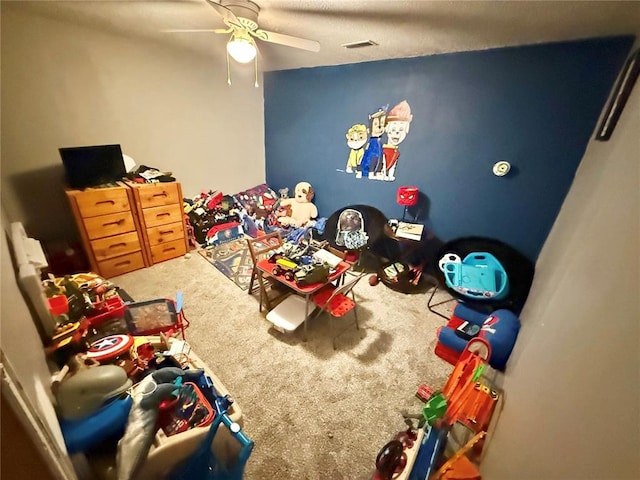 723 Ada St, Bismarck, MO 63624 - game room with carpet flooring and a ceiling fan