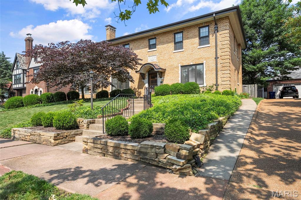 7251 Kingsbury Blvd, University City, MO 63130 - view of front of property featuring a chimney and brick siding
