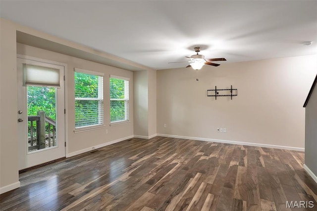 32 Loris Ln, Saint Charles, MO 63303 - spare room with a ceiling fan and dark wood-style flooring