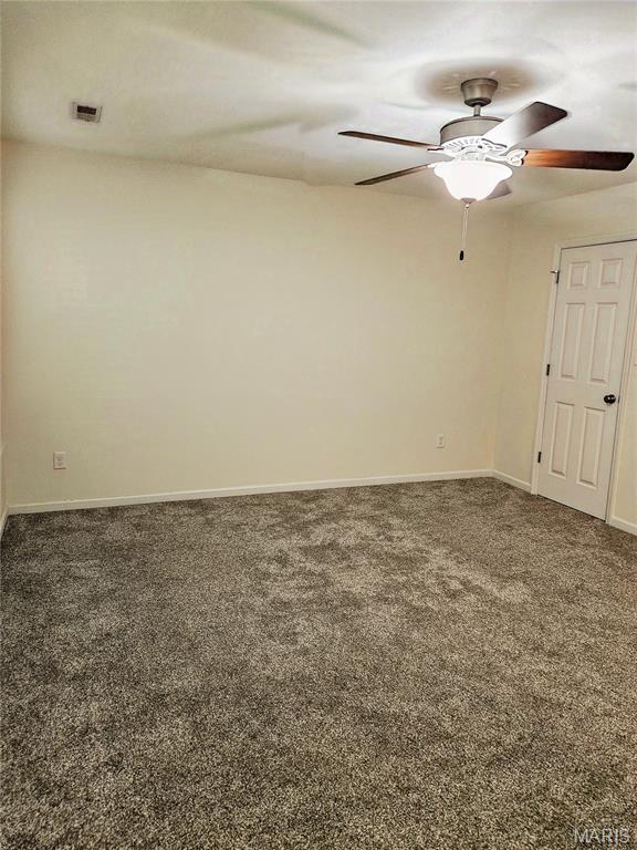 32 Loris Ln, Saint Charles, MO 63303 - spare room with carpet flooring and ceiling fan