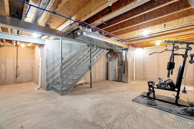 32 Loris Ln, Saint Charles, MO 63303 - unfinished basement with water heater, stairway, and heating unit