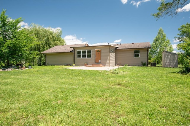 9268 Pin Oak Rd, Edwardsville, IL 62025 - back of property featuring a patio area, a lawn, entry steps, and cooling unit