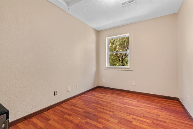 9268 Pin Oak Rd, Edwardsville, IL 62025 - empty room featuring wood finished floors and baseboards