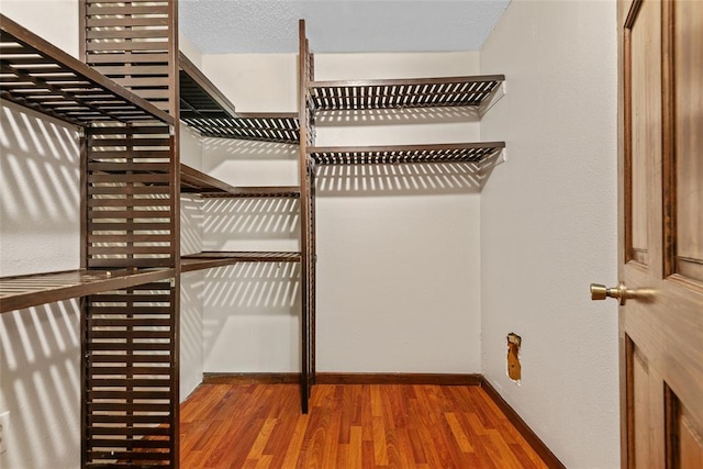 9268 Pin Oak Rd, Edwardsville, IL 62025 - spacious closet with wood finished floors