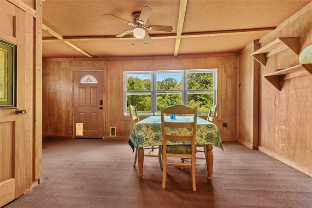 9268 Pin Oak Rd, Edwardsville, IL 62025 - dining area featuring wood walls and a ceiling fan