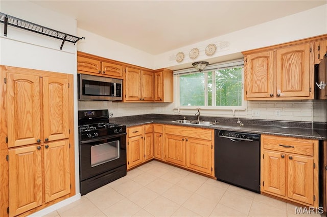 1968 Centurion Dr, Fenton, MO 63026 - kitchen with black appliances, a sink, dark countertops, backsplash, and light tile patterned flooring