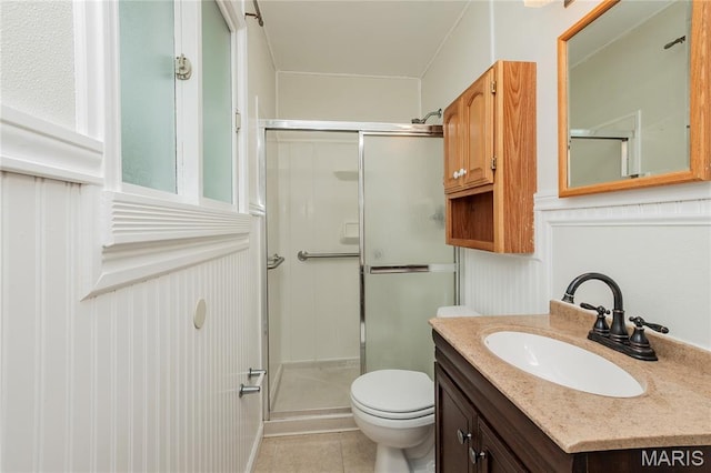 1968 Centurion Dr, Fenton, MO 63026 - bathroom featuring a shower stall, toilet, vanity, and tile patterned floors