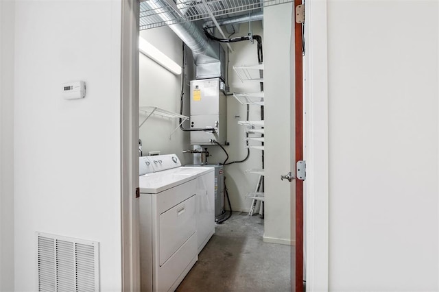 1720 Chouteau Ave Unit 303, Saint Louis, MO 63103 - laundry room with independent washer and dryer