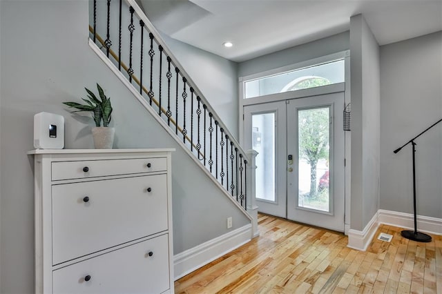 4412 Chouteau, Saint Louis, MO 63110 - entrance foyer featuring stairway, baseboards, light wood-type flooring, and recessed lighting