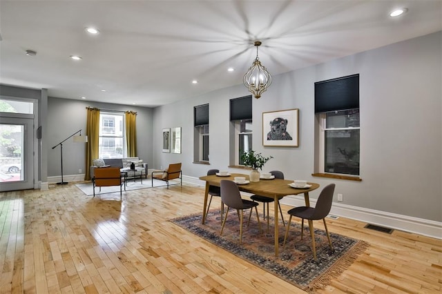 4412 Chouteau, Saint Louis, MO 63110 - dining space with hardwood / wood-style floors, baseboards, and recessed lighting