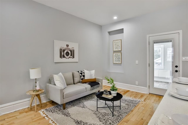 4412 Chouteau, Saint Louis, MO 63110 - living room with hardwood / wood-style floors, baseboards, and recessed lighting