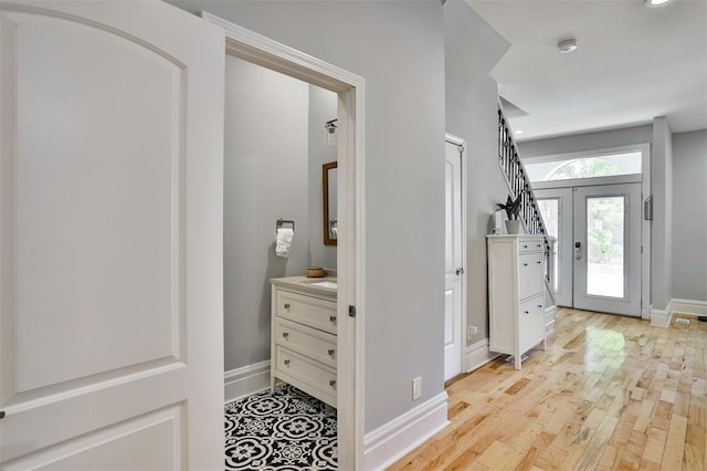 4412 Chouteau, Saint Louis, MO 63110 - entrance foyer with baseboards, light wood finished floors, and recessed lighting