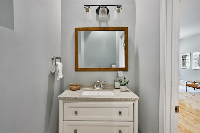 4412 Chouteau, Saint Louis, MO 63110 - bathroom featuring vanity and wood finished floors