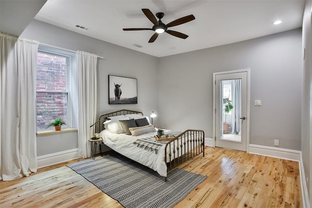 4412 Chouteau, Saint Louis, MO 63110 - bedroom with hardwood / wood-style flooring, multiple windows, baseboards, ceiling fan, and recessed lighting