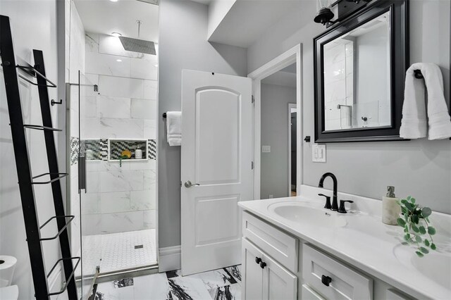 4412 Chouteau, Saint Louis, MO 63110 - bathroom with marble look tiles, a marble finish shower, and vanity