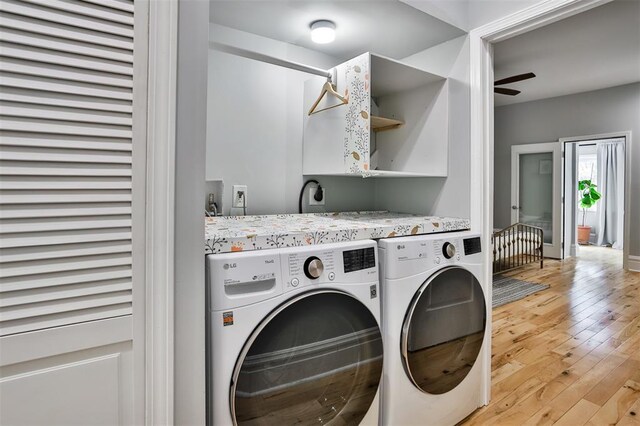4412 Chouteau, Saint Louis, MO 63110 - washroom with separate washer and dryer and light wood-type flooring