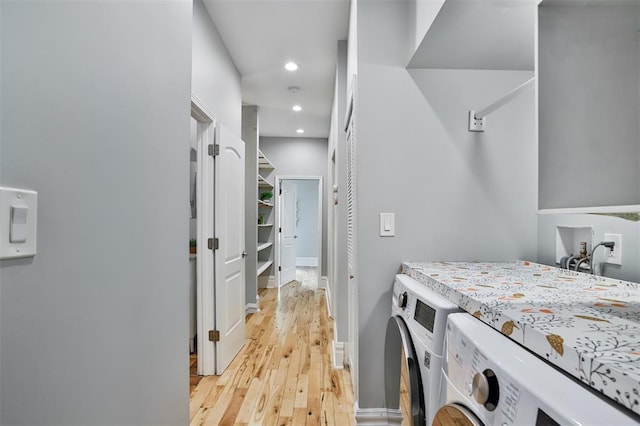 4412 Chouteau, Saint Louis, MO 63110 - laundry area with independent washer and dryer, light wood-type flooring, recessed lighting, and baseboards
