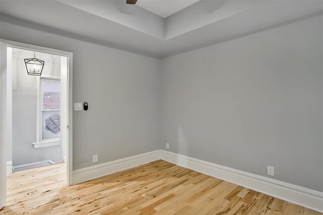4412 Chouteau, Saint Louis, MO 63110 - unfurnished room with wood finished floors, baseboards, and a ceiling fan